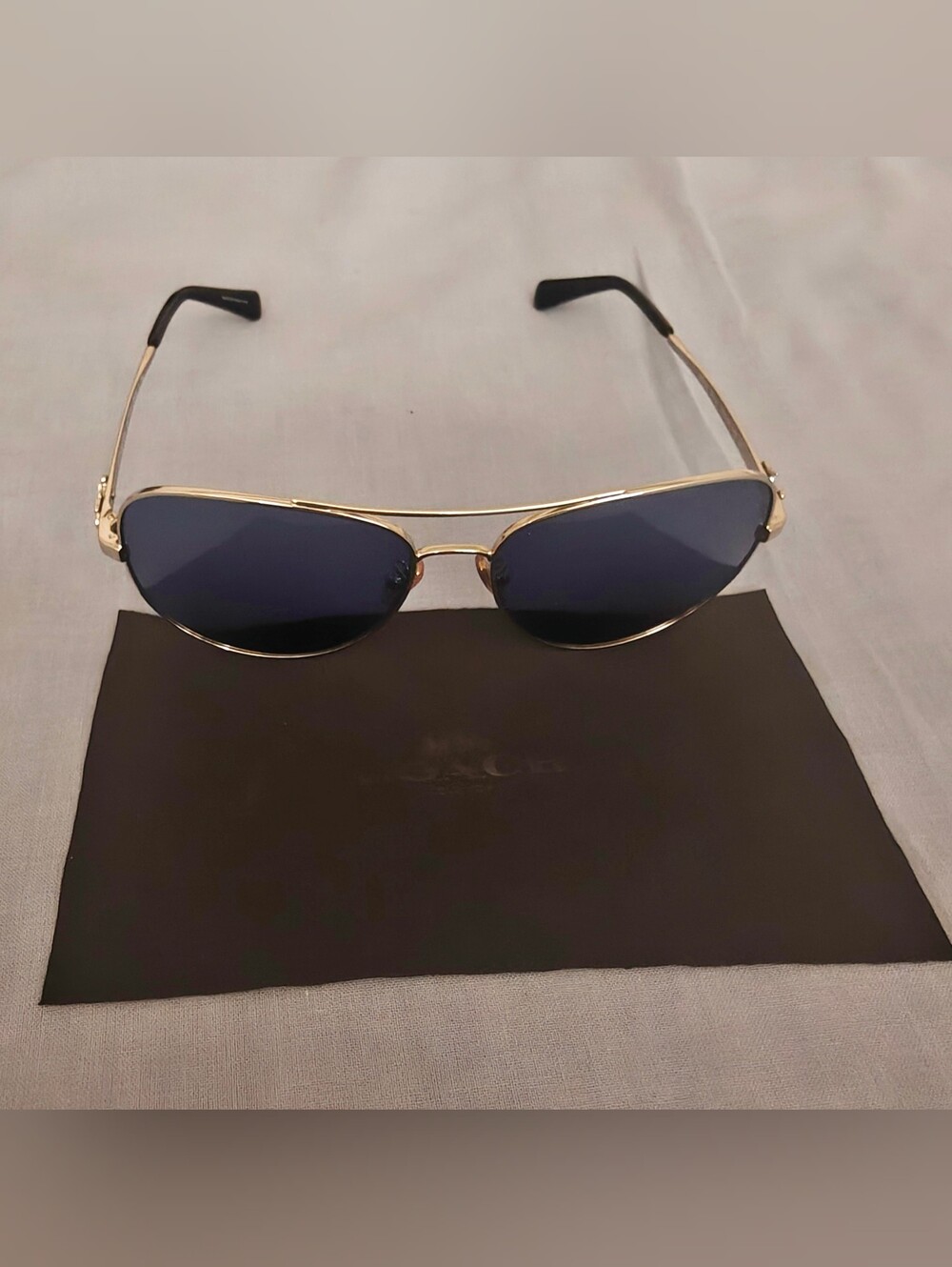 Coach Sunglasses with Silver Frame and Blue Lenses